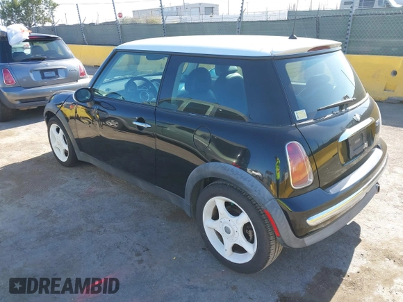 2002 MINI Hardtop with VIN WMWRC33402TC32985, listed as a IAAI auction lot 42608636 with 159,996 mi miles and . Bid and sale history available at DreamBid. Image 3.