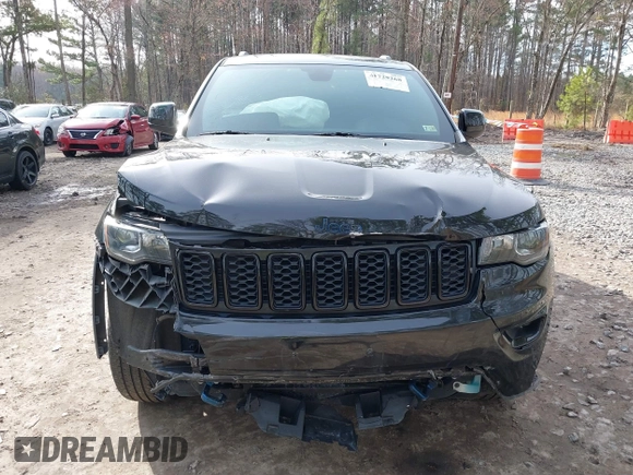 2018 Jeep Grand Cherokee Laredo E with VIN 1C4RJFAG1JC426542, listed as a IAAI auction lot 41729268 with 106,024 mi miles and . Bid and sale history available at DreamBid. Image 6.