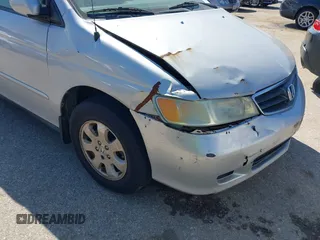 2002 Honda Odyssey EX-L z VIN 5FNRL18062B011890, wystawiony jako IAAI lot #41972294 z przebiegiem 245 889 mil mil oraz . Historia ofert i sprzedaży dostępna na DreamBid. Obrazek 6.