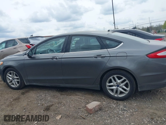 2014 Ford Fusion SE with VIN 3FA6P0H79ER222573, listed as a IAAI auction lot 42129165 with 144,181 mi miles and . Bid and sale history available at DreamBid. Image 13.