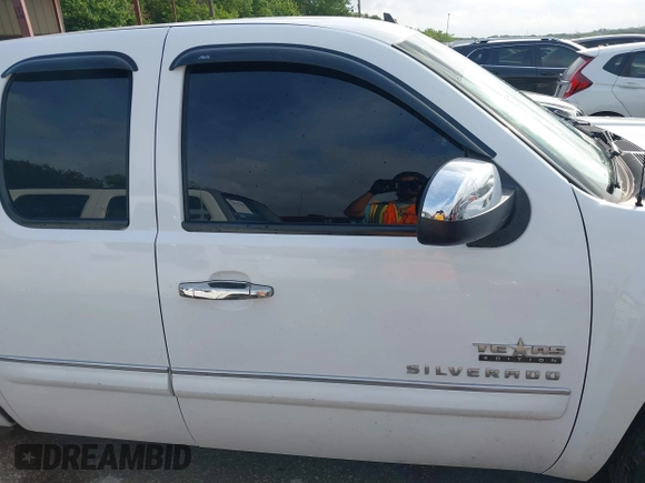 2013 Chevrolet Silverado 1500 LT with VIN 1GCRCSE05DZ366248, listed as a IAAI auction lot 42122068 with 233,316 mi miles and . Bid and sale history available at DreamBid. Image 13.