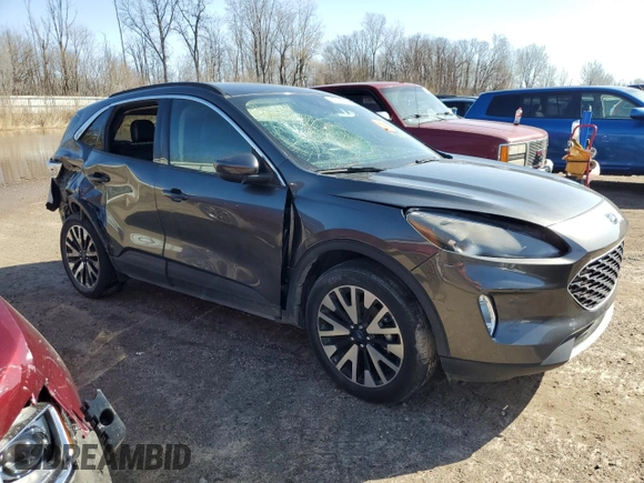 2020 Ford Escape SEL z VIN 1FMCU9H98LUA39419, wystawiony jako Copart lot #51360235 z przebiegiem 99 012 mil mil oraz Czysty tytuł • Clean title. Historia ofert i sprzedaży dostępna na DreamBid. Obrazek 4.