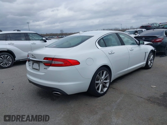 2015 Jaguar XF V6 Portfolio with VIN SAJWA0F7XF8U88039, listed as a IAAI auction lot 41459904 with 83,927 mi miles. Bid and sale history available at carsss.com. Image 4.
