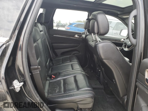 2017 Jeep Grand Cherokee Overland z VIN 1C4RJFCG2HC700029, wystawiony jako Copart lot #48120525 z przebiegiem 107 369 mil mil oraz Szkoda całkowita • Salvage title. Historia ofert i sprzedaży dostępna na DreamBid. Obrazek 11.