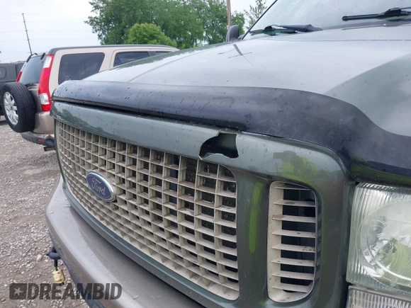 2004 Ford Excursion Eddie Bauer z VIN 1FMSU45P44EA89487, wystawiony jako IAAI lot #42318848 z przebiegiem 210 631 mil mil oraz . Historia ofert i sprzedaży dostępna na DreamBid. Obrazek 6.