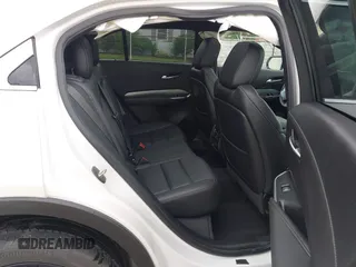 2022 Cadillac XT4 AWD Premium Luxury z VIN 1GYFZDR42NF128199, wystawiony jako IAAI lot #42522314 z przebiegiem 29 002 mil mil oraz . Historia ofert i sprzedaży dostępna na DreamBid. Obrazek 8.