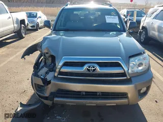 2006 Toyota 4Runner SR5 with VIN JTEBU14R268066938, listed as a IAAI auction lot 41876411 with 206,776 mi miles. Bid and sale history available at carsss.com. Image 12.