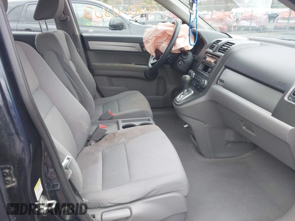 2011 Honda CR-V LX with VIN JHLRE4H38BC029698, listed as a IAAI auction lot 42021803 with 92,071 mi miles. Bid and sale history available at carsss.com. Image 5.