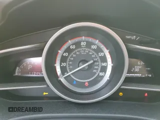2014 Mazda 3 i Touring with VIN JM1BM1V7XE1195423, listed as a Copart auction lot 56702485 with 113,442 mi miles and Salvage title. Bid and sale history available at DreamBid. Image 9.