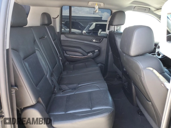 2019 Chevrolet Suburban LT z VIN 1GNSCHKC9KR274826, wystawiony jako Copart lot #51349055 z przebiegiem 37 826 mil mil oraz Szkoda całkowita • Salvage title. Historia ofert i sprzedaży dostępna na DreamBid. Obrazek 11.