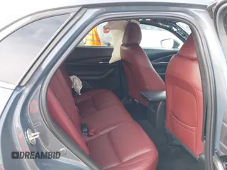 2023 Mazda CX-30 S Carbon Edition with VIN 3MVDMBCM7PM589019, listed as a IAAI auction lot 41251168 with 23,847 mi miles and . Bid and sale history available at DreamBid. Image 8.