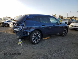 2025 BMW iX xDrive50 with VIN WB523CF01SCT04234, listed as a Copart auction lot 43649065 with 2,189 mi miles and Salvage Title. Bid and sale history available at carsss.com. Image 3.