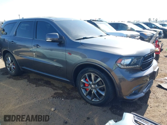 2014 Dodge Durango R/T z VIN 1C4SDJCT5EC591649, wystawiony jako IAAI lot #42346947 z przebiegiem 143 143 mil mil oraz . Historia ofert i sprzedaży dostępna na DreamBid. Obrazek 1.