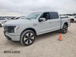 2023 Ford F-150 Lightning Pro with VIN 1FT6W1EV2PWG18902, listed as a Copart auction lot 58089765 with 13,765 mi miles and Salvage title. Bid and sale history available at DreamBid. Image 1.