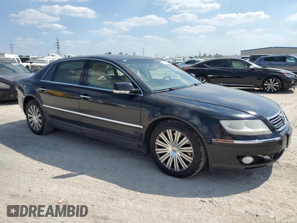2005 Volkswagen Phaeton z VIN WVWAF03D658003589, wystawiony jako Copart lot #74049134 z przebiegiem 124 506 mil mil oraz Tytuł czysty. Historia ofert i sprzedaży dostępna na DreamBid. Obrazek 4.