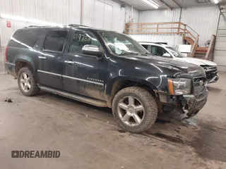 2012 Chevrolet Suburban LTZ with VIN 1GNSKKE78CR239310, listed as a IAAI auction lot 41976511 with 243,504 mi miles and . Bid and sale history available at DreamBid. Image 1.