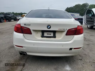 2016 BMW 5 Series 528i xDrive with VIN WBA5A7C5XGG148447, listed as a Copart auction lot 56825455 with 128,800 mi miles and Clean title. Bid and sale history available at DreamBid. Image 6.