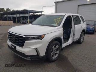 2023 Honda Pilot EX-L with VIN 5FNYG1H58PB016138, listed as a IAAI auction lot 40591717 with 10,068 mi miles and . Bid and sale history available at DreamBid. Image 18.