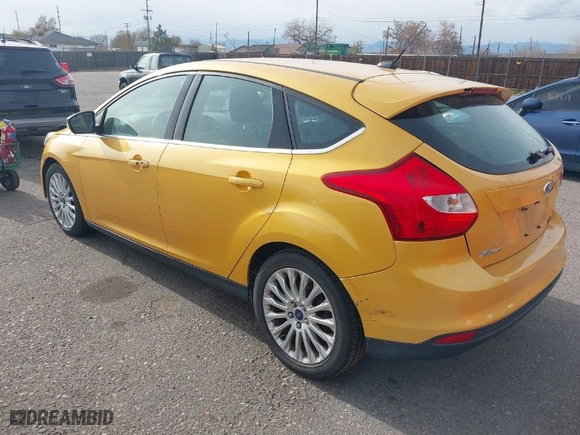 2012 Ford Focus Titanium with VIN 1FAHP3N22CL189401, listed as a IAAI auction lot 40978545 with NaN miles. Bid and sale history available at carsss.com. Image 3.