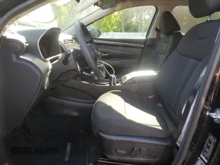 2023 Hyundai Tucson SEL z VIN 5NMJBCAE1PH290396, wystawiony jako Copart lot #63268125 z przebiegiem 19 859 mil mil oraz Szkoda całkowita • Salvage title. Historia ofert i sprzedaży dostępna na DreamBid. Obrazek 7.
