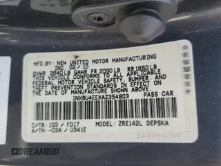 2010 Toyota Corolla with VIN 1NXBU4EEXAZ354803, listed as a Copart auction lot 61013865 with 223,171 mi miles and Salvage title. Bid and sale history available at DreamBid. Image 12.