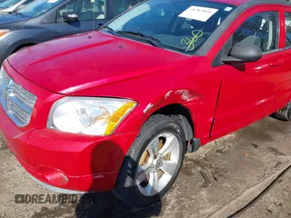 2012 Dodge Caliber SXT with VIN 1C3CDWDA7CD533844, listed as a IAAI auction lot 41391978 with 149,762 mi miles and . Bid and sale history available at DreamBid. Image 6.