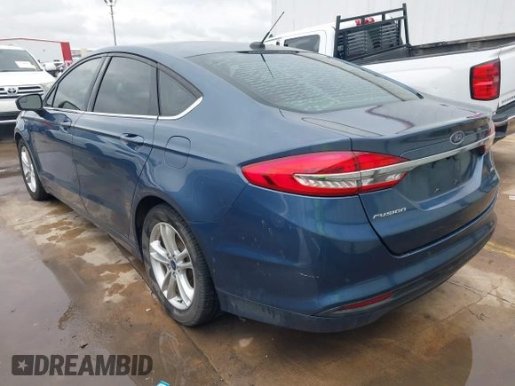 2018 Ford Fusion SE with VIN 3FA6P0H73JR109454, listed as a IAAI auction lot 42438366 with 105,802 mi miles and . Bid and sale history available at DreamBid. Image 3.