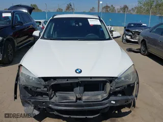 2014 BMW X1 sDrive28i with VIN WBAVM1C5XEVW53725, listed as a IAAI auction lot 41859427 with 181,892 mi miles. Bid and sale history available at carsss.com. Image 13.