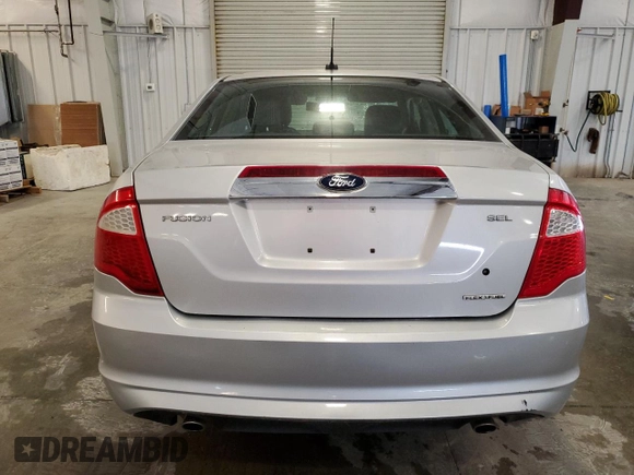 2012 Ford Fusion SEL with VIN 3FAHP0JG2CR274840, listed as a Copart auction lot 62123135 with 122,517 mi miles and Salvage title. Bid and sale history available at DreamBid. Image 6.