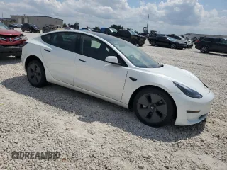 2023 Tesla Model 3 z VIN 5YJ3E1EA1PF608109, wystawiony jako Copart lot #72243744 z przebiegiem 10 165 mil mil oraz Szkoda całkowita • Salvage title. Historia ofert i sprzedaży dostępna na DreamBid. Obrazek 4.