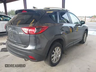 2016 Mazda CX-5 Touring with VIN JM3KE4CY4G0779827, listed as a IAAI auction lot 41840727 with 91,367 mi miles. Bid and sale history available at carsss.com. Image 4.