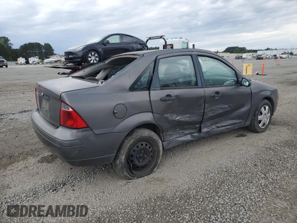 2007 Ford Focus S с VIN 1FAFP34NX7W317259, выставлен на аукционе Copart как лот 52158405 с пробегом 206 602 миль миль и Списание • Salvage title. История ставок и продаж доступна на DreamBid. Изображение 3.