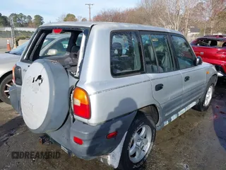 1997 Toyota RAV4 with VIN JT3HP10V7V7063874, listed as a IAAI auction lot 41711332 with 152,849 mi miles and . Bid and sale history available at DreamBid. Image 4.