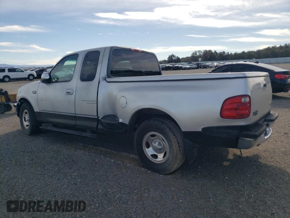 2001 Ford F-150 XL with VIN 1FTZX07261KF67717, listed as a Copart auction lot 78946214 with Not provided miles and Salvage title. Bid and sale history available at DreamBid. Image 2.