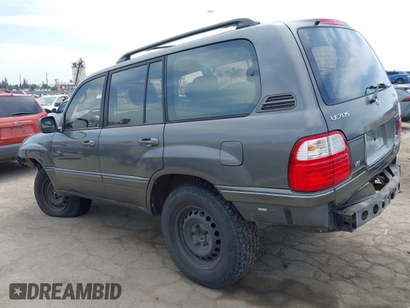 2001 Lexus LX 470 z VIN JTJHT00WX13509489, wystawiony jako IAAI lot #42227083 z przebiegiem 360 283 mil mil oraz . Historia ofert i sprzedaży dostępna na DreamBid. Obrazek 3.