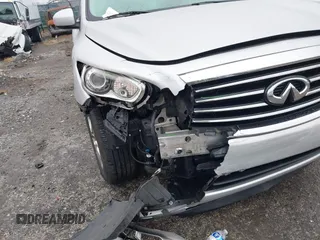 2015 Infiniti QX60 with VIN 5N1AL0MM4FC554511, listed as a IAAI auction lot 41065737 with 205,077 mi miles and . Bid and sale history available at DreamBid. Image 6.