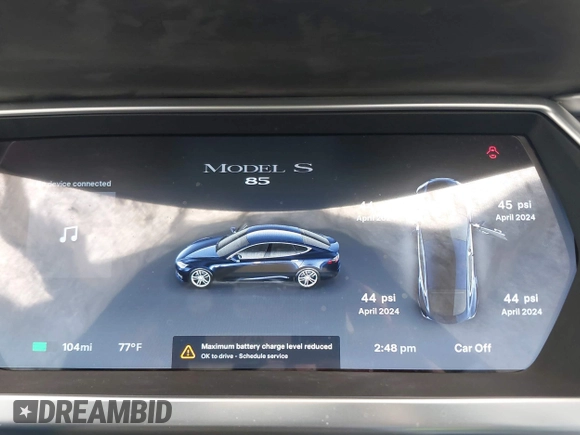 2013 Tesla Model S with VIN 5YJSA1CNXDFP06077, listed as a IAAI auction lot 41958105 with 84,773 mi miles. Bid and sale history available at carsss.com. Image 7.