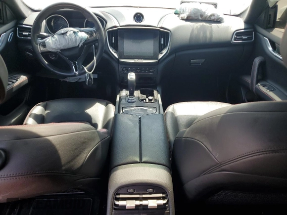 2019 Maserati Ghibli z VIN ZAM57XSA6K1319461, wystawiony jako Copart lot #57321665 z przebiegiem Nie podano mil oraz Tytuł czysty. Historia ofert i sprzedaży dostępna na DreamBid. Obrazek 8.