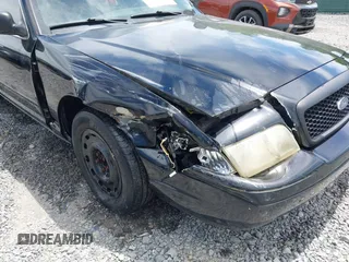 2005 Ford Police Interceptor z VIN 2FAHP71WX5X158807, wystawiony jako IAAI lot #42282107 z przebiegiem 153 787 mil mil oraz . Historia ofert i sprzedaży dostępna na DreamBid. Obrazek 6.