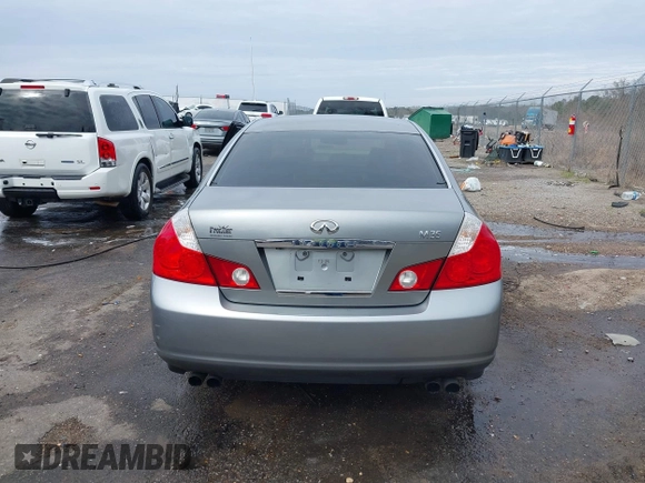 2007 Infiniti M Sport z VIN JNKAY01E47M308944, wystawiony jako IAAI lot #41514395 z przebiegiem 166 936 mil mil oraz . Historia ofert i sprzedaży dostępna na DreamBid. Obrazek 16.