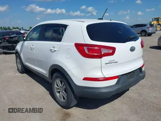 2011 Kia Sportage LX with VIN KNDPB3A26B7114119, listed as a IAAI auction lot 42105997 with 186,432 mi miles and . Bid and sale history available at carsss.com. Image 3.
