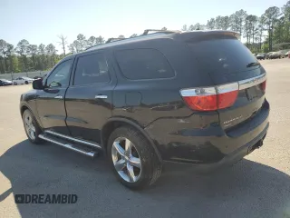 2012 Dodge Durango Citadel z VIN 1C4RDJEG3CC301467, wystawiony jako Copart lot #52531575 z przebiegiem 270 719 mil mil oraz Szkody całkowita. Historia ofert i sprzedaży dostępna na DreamBid. Obrazek 2.