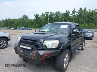 2013 Toyota Tacoma with VIN 3TMLU4EN4DM117239, listed as a IAAI auction lot 42494359 with 239,635 mi miles and . Bid and sale history available at DreamBid. Image 2.