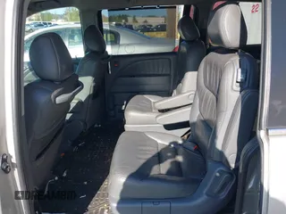 2005 Honda Odyssey TOURING with VIN 5FNRL38855B069043, listed as a IAAI auction lot 42035153 with 236,533 mi miles. Bid and sale history available at carsss.com. Image 8.
