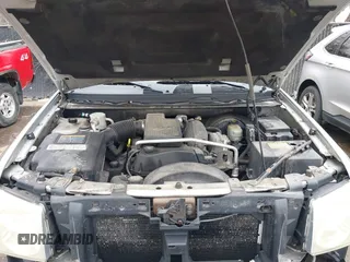 2005 GMC Envoy SLE with VIN 1GKDT13S552332088, listed as a IAAI auction lot 41699178 with 196,869 mi miles. Bid and sale history available at carsss.com. Image 10.