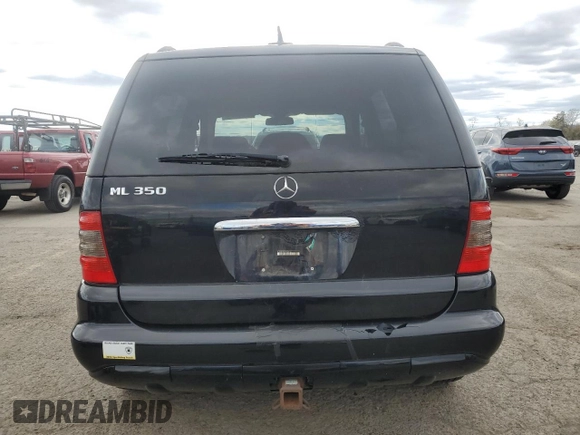 2005 Mercedes-Benz M 350 with VIN 4JGAB57E95A556723, listed as a Copart auction lot 52584115 with 232,283 mi miles and Salvage title. Bid and sale history available at DreamBid. Image 6.