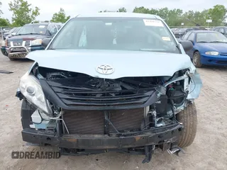 2016 Toyota Sienna L with VIN 5TDZK3DC5GS710011, listed as a IAAI auction lot 42358731 with 119,104 mi miles and . Bid and sale history available at DreamBid. Image 6.