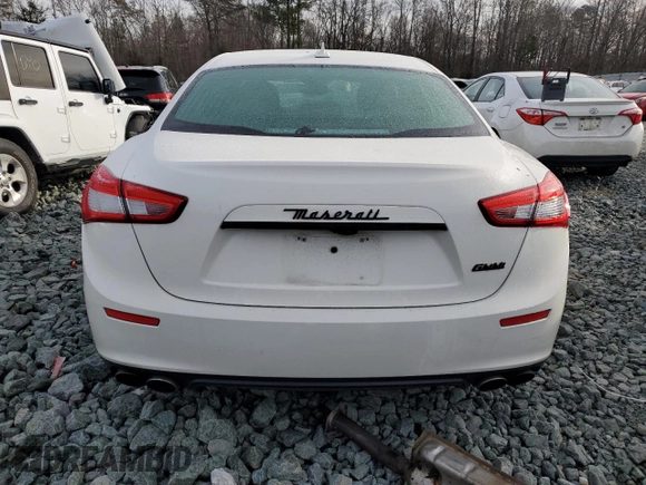 2017 Maserati Ghibli with VIN ZAM57XSAXH1217301, listed as a Copart auction lot 40090954 with 107,514 mi miles. Bid and sale history available at carsss.com. Image 6.