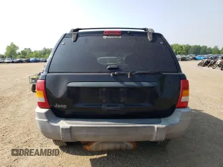 2000 Jeep Grand Cherokee Laredo with VIN 1J4GW48S6YC404063, listed as a Copart auction lot 59442725 with 268,543 mi miles and Salvage title. Bid and sale history available at DreamBid. Image 6.