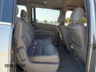 2009 Honda Odyssey EX-L with VIN 5FNRL38799B034292, listed as a Copart auction lot 52547205 with 116,658 mi miles and Salvage Title. Bid and sale history available at DreamBid. Image 12.